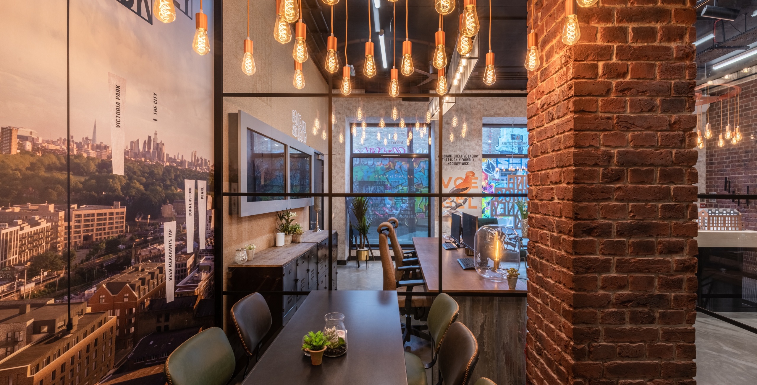 Marketing suite with screens, photos and 3D models displaying the development