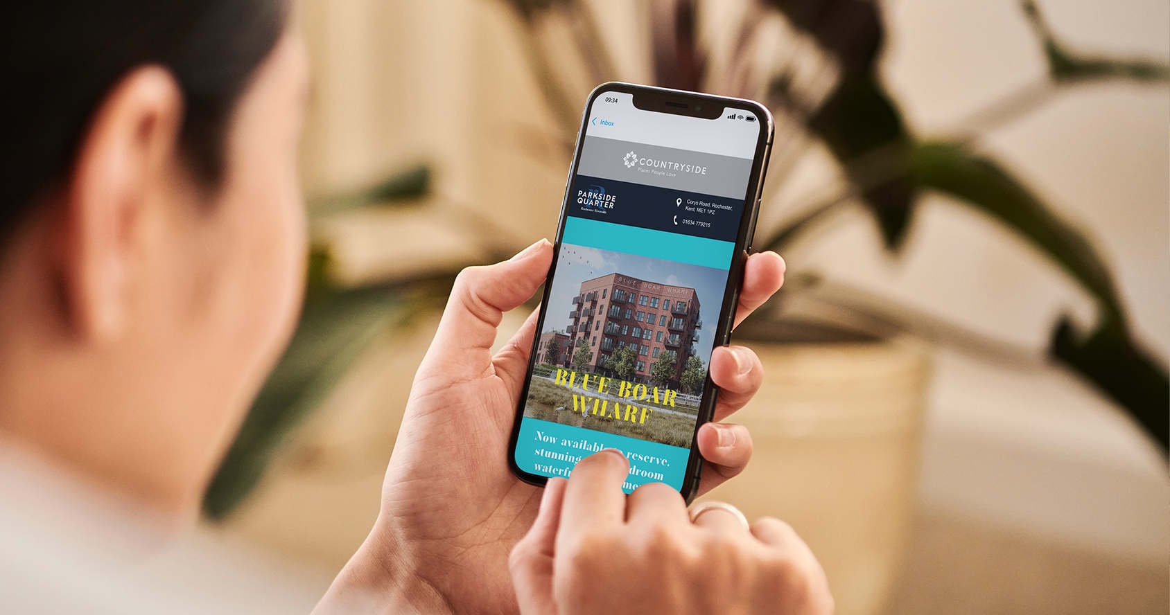 Woman using her phone to look at a website