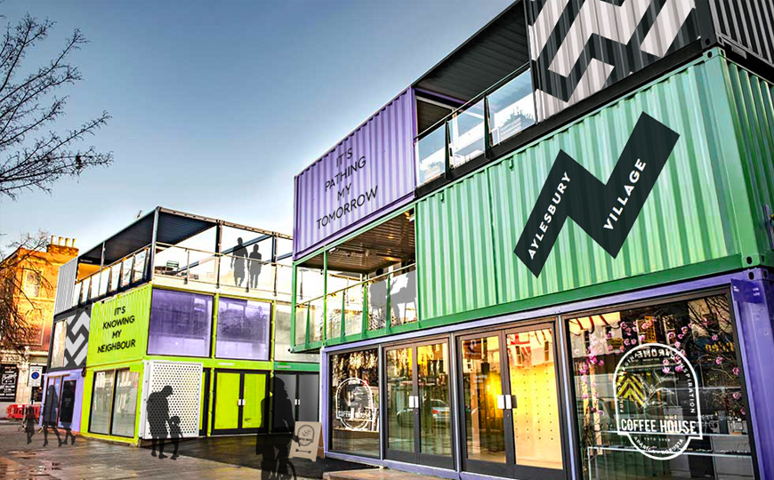 Small shops made from reused shipping containers stacked on top of each other