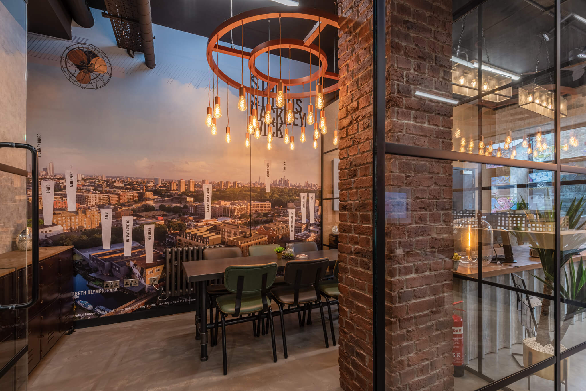 a long table in the middle of a room and a large chandelier above it