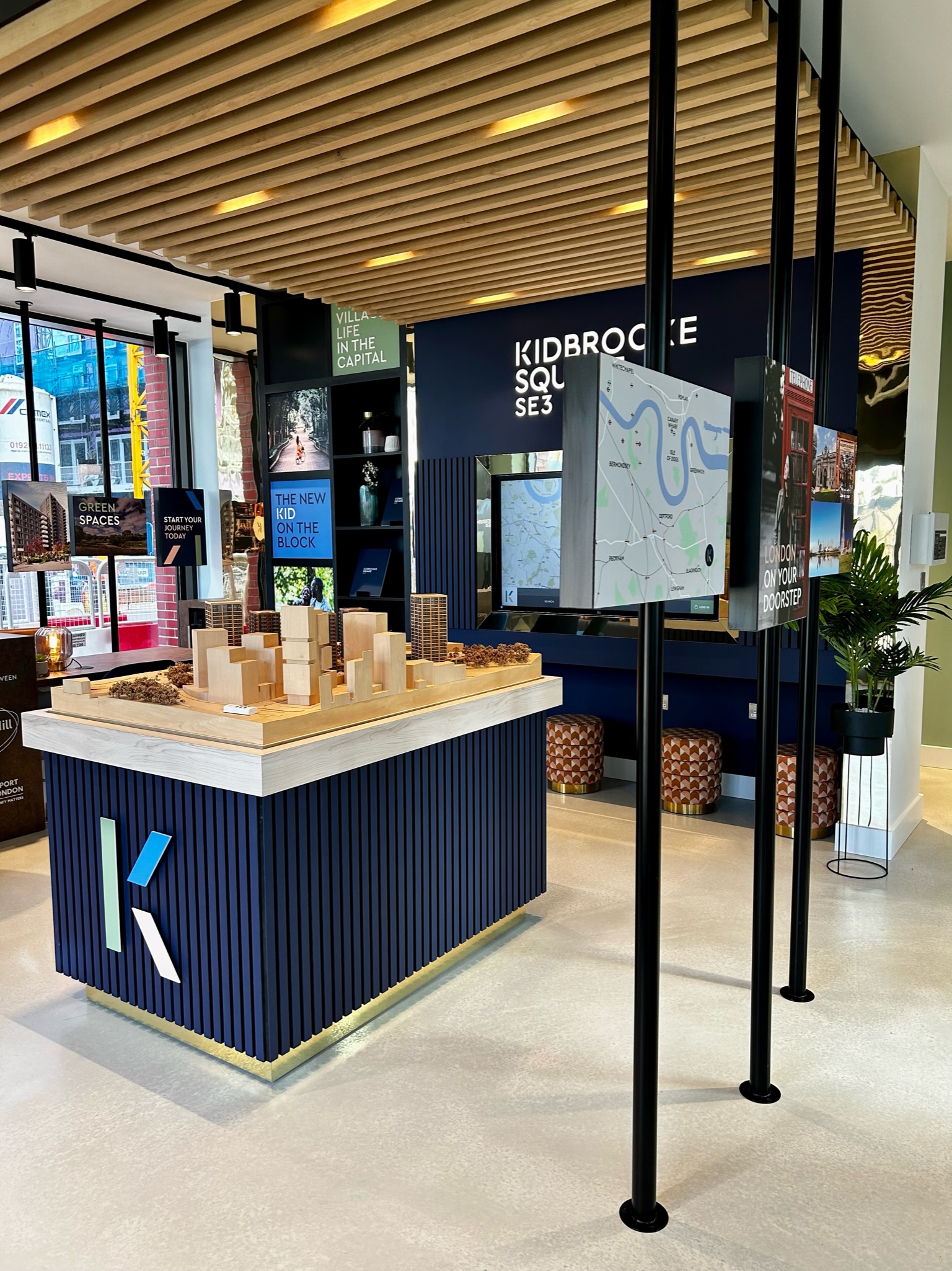 marketing suite with a large wooden 3D model of the city around the development